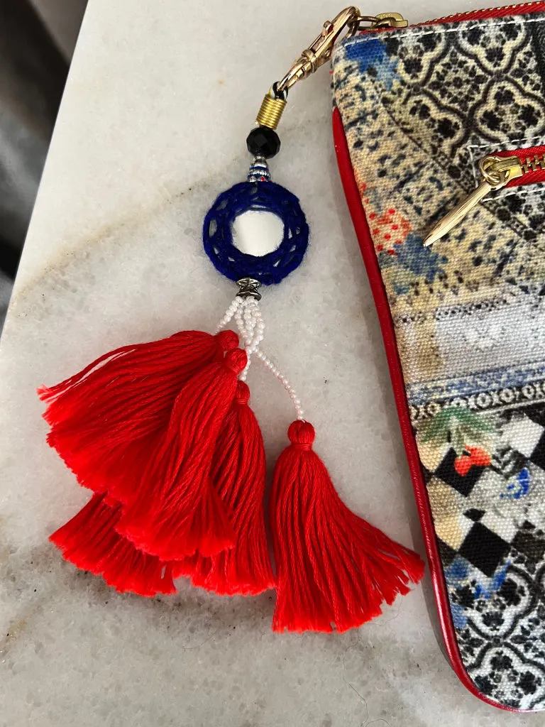 Camilla Clutch with Mirror and Red Tassels